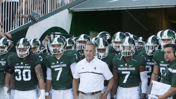 MARK DANTONIO LED THE SPARTANS INTO HIS 10TH SEASON TONIGHT.  PHOTO COURTESY OF STARR PORTICE.